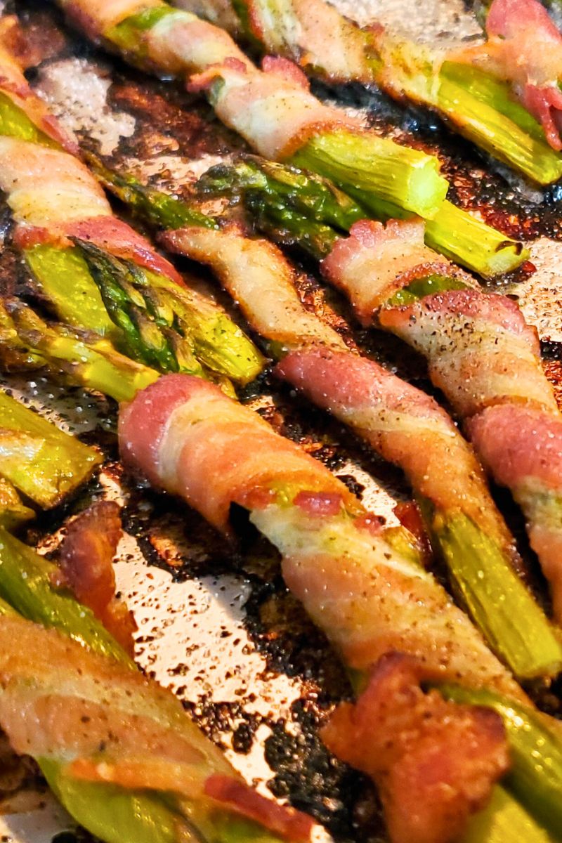 Easy crispy oven baked bacon wrapped asparagus.
